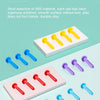 A collection of colorful hammer nails in yellow, blue, and red are displayed on white trays for a fine motor skill game.