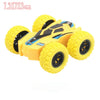 Yellow four-wheel drive stunt car with black accents and large tires