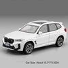 White 1:32 scale diecast model of a BMW X3M car with lights and sound features.