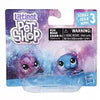 A package for a set of three small pet shop animal figures featuring purple and blue colors.