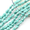 A strand of light blue heart-shaped acrylic beads for jewelry making