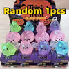 A box of Random 1pcs Treat nice cube stress relief balls in various colors including green, blue, and purple.