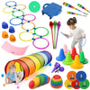 A colorful set of balance stones and sensory toys including a blue toy, green ball, and various colored rings.