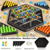A combination of 133 chess pieces, four chassis, forty-four rubber bands, and one chessboard for a strategy game.