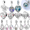 A collection of various heart-shaped sterling silver charms and pendants for bracelets and necklaces.