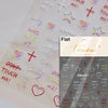 Sheet of Flat Tomoni nail art stickers featuring various words and symbols like Love, Lucky, Don't Touch Me, Who Are U
