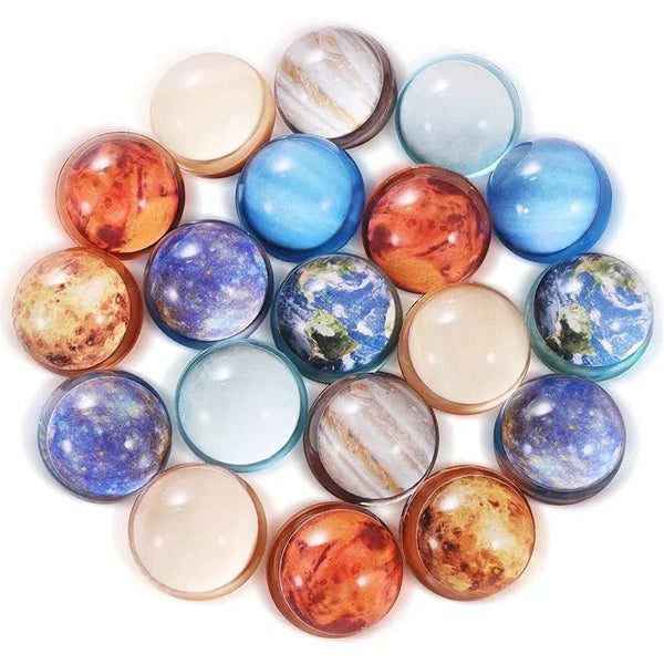 Assorted rubber bouncy balls in various colors and textures arranged in a circular pattern.