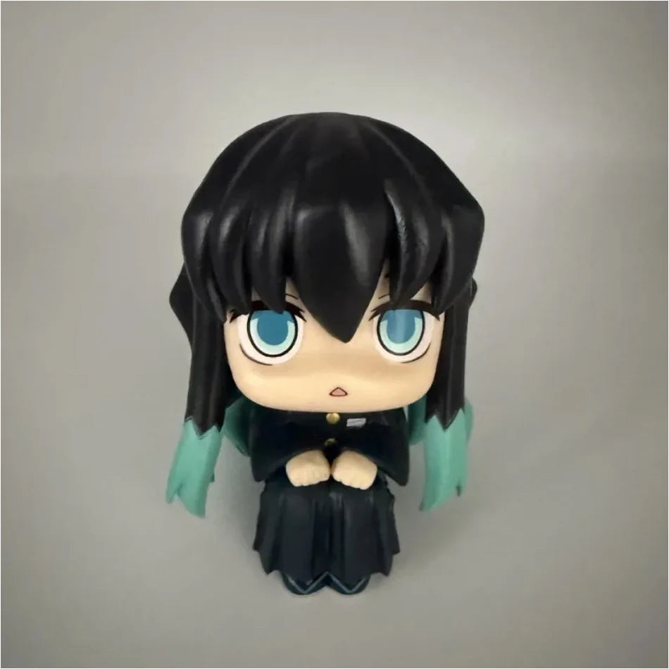 A set of four Demon Slayer anime action figures featuring characters like Tanjirou and Nezuko.