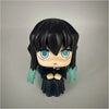 A set of four Demon Slayer anime action figures featuring characters like Tanjirou and Nezuko.