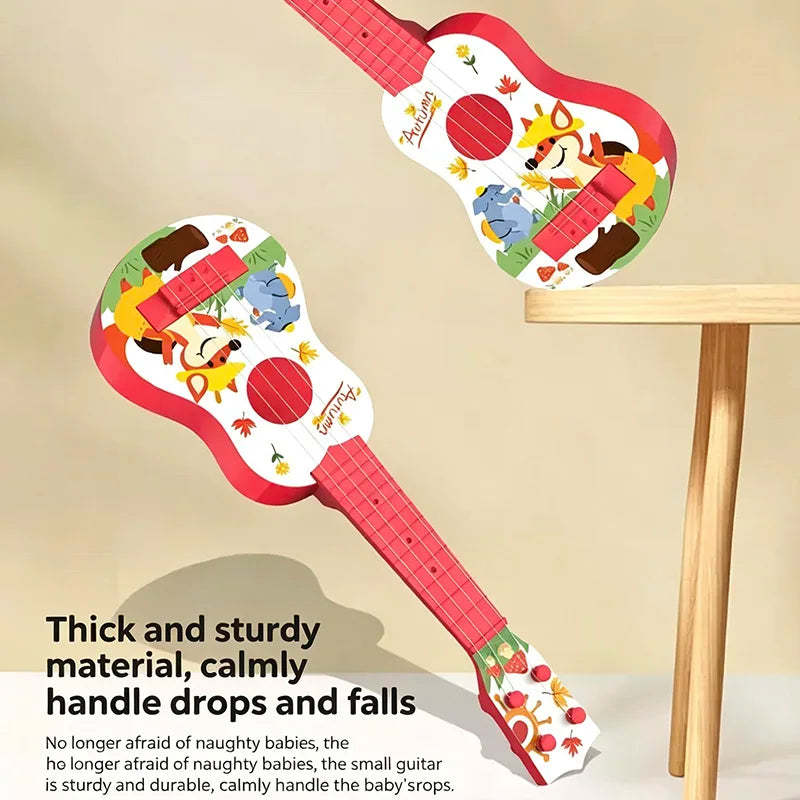 A wooden ukulele toy with colorful decorations and a pink handle is shown resting on a light wood table.