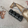 A fidget keychain featuring a horse charm and four black clicky acrylic key buttons on a silver chain.