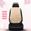 A black car seat cushion with a beige quilted cover and black leather trim, shown against a white background.