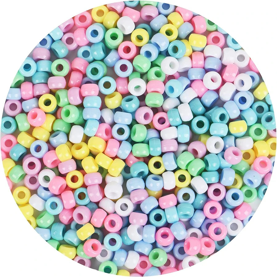 A circular arrangement of multicolor pony beads in various shades of pink, blue, green, and yellow.