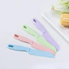 A set of five kid-friendly safety knives in pastel colors, including pink, mint green, lavender, and light blue.