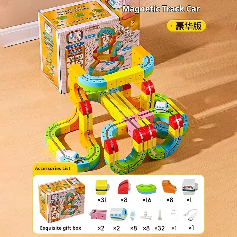 A yellow and green magnetic track car set with various accessories displayed next to its original box.