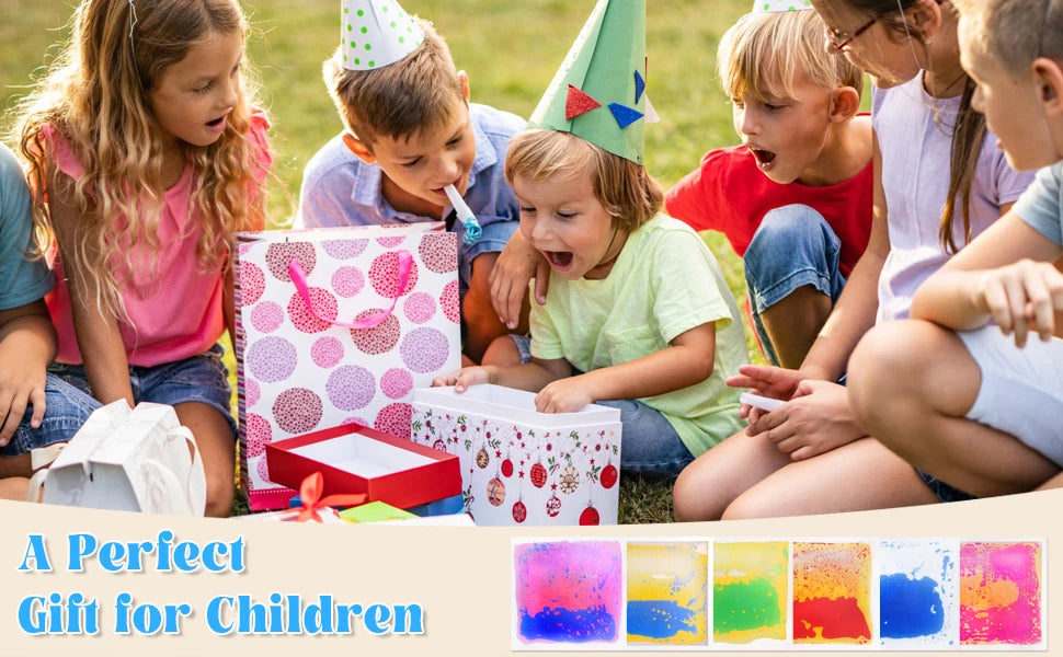 A group of children are excitedly playing with colorful liquid sensory play mats and containers outdoors.