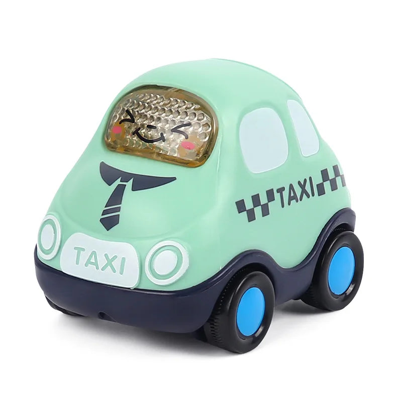 A light green push and go toy car with a clear headlight and black wheels.