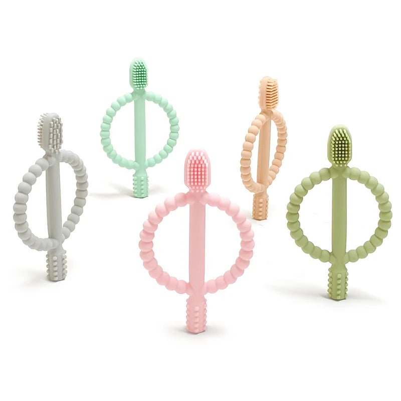 A collection of soft silicone baby teethers in various pastel colors, including green, pink, and beige.