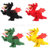 A set of six African wildlife animal building blocks in black, red, green, and yellow.