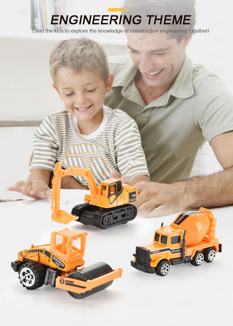 A boy and man look at an orange diecast construction vehicle playset on a white surface.