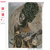 A black portrait of an African woman with intricate patterns and gold jewelry, suitable for diamond painting.