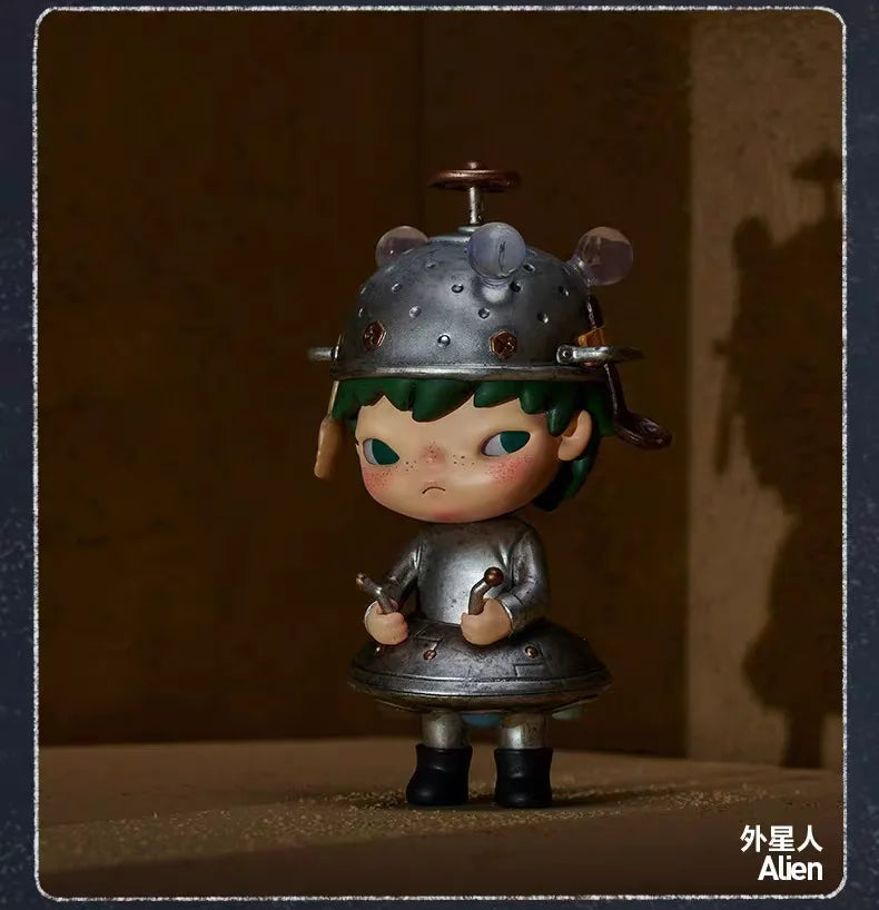 A collectible figurine of a small, stylized character wearing a metal helmet and armor.