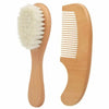 Peine de madera de haya natural con cepillo y dientes claros para el cuidado del cabello del recién nacido.