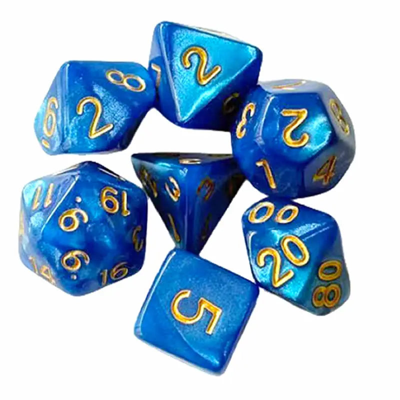 A set of seven blue polyhedral dice used for tabletop games and role-playing.