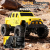Yellow off-road RC car demonstrating spring damping system on rough terrain