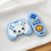 Juguete de silicona azul claro dual para masticar con cara de oso y león con botones.