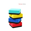 A set of three rectangular felt pads in cyan, yellow, and blue stacked together.