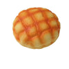 A round, orange-colored bread squeeze toy with a textured surface.