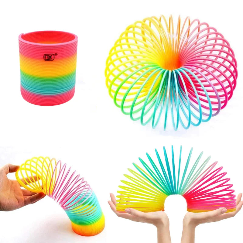 A colorful spring circle toy in rainbow colors is shown in various forms, including a stand and hand-held version.