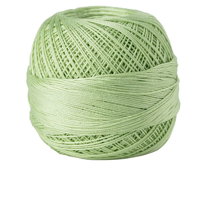 A ball of light green 100% cotton crochet thread for tatting and embroidery.