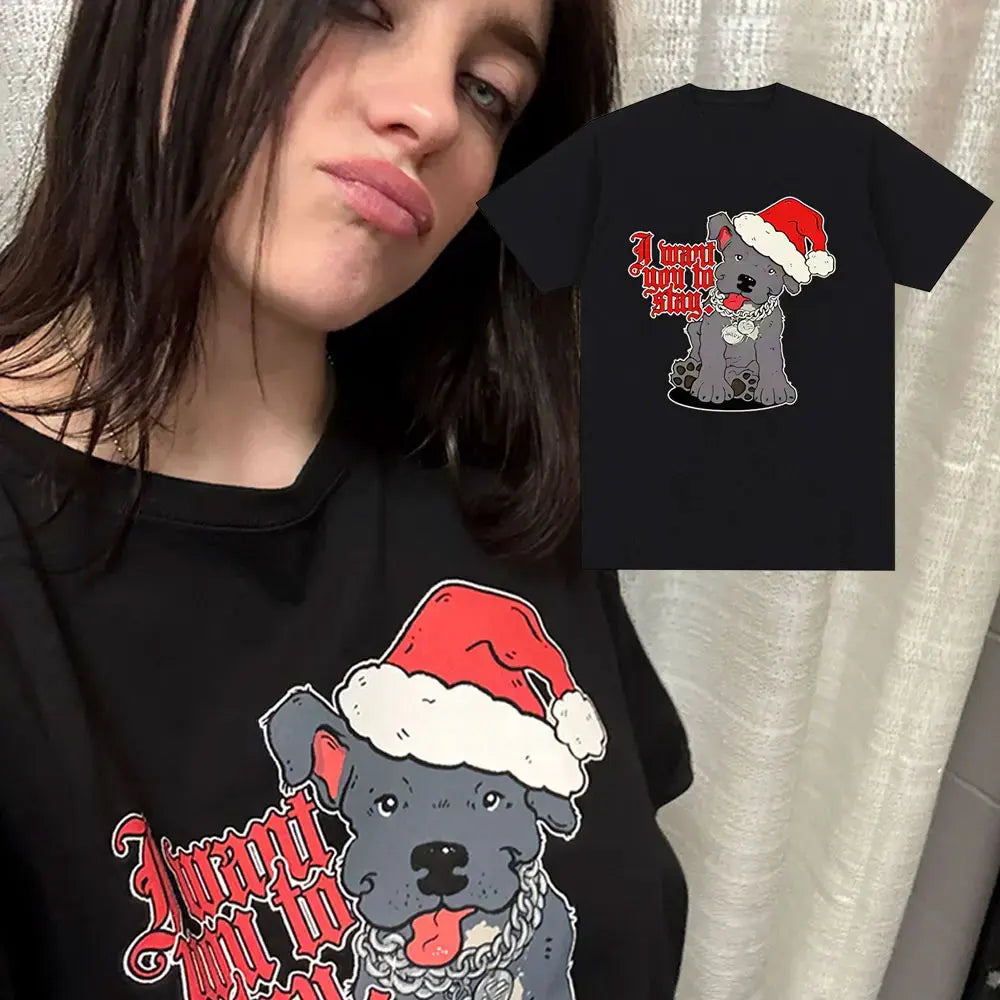 A black t-shirt featuring a graphic design of a dog wearing a Santa hat and text.