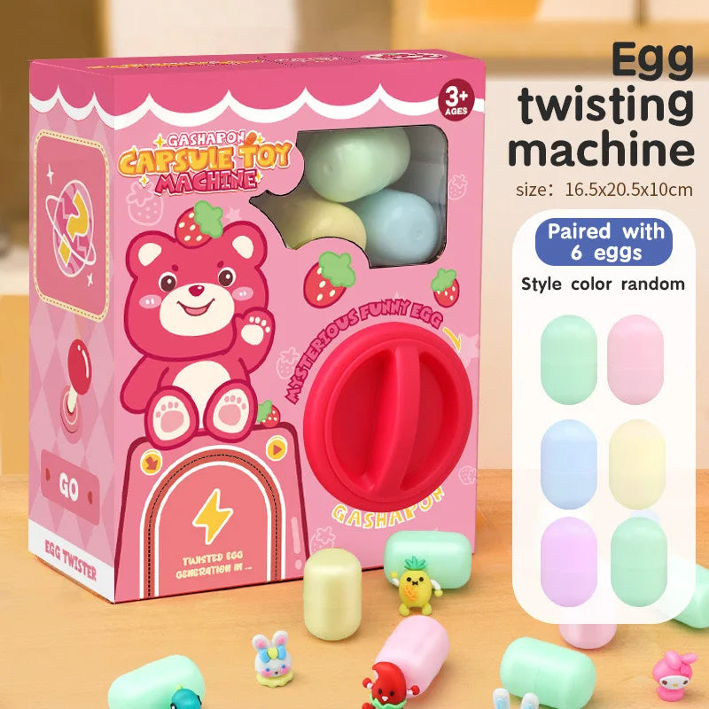 A box of a Gashapon toy machine featuring a pink strawberry character and a red egg twister with six colored eggs.