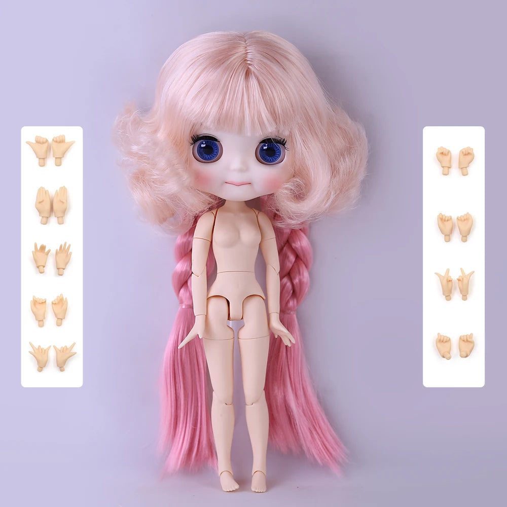 A pink Blyth 1/6 scale fashion doll with large blue eyes and long hair, shown with accessory parts.