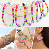 A collection of colorful beads and charms used for jewelry making, displayed on a white woven tray and on hands.