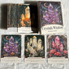 A collection of Crystals Wisdom Oracle Cards featuring amethyst, clear quartz, and rose quartz stones.