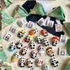 A collection of panda blind box collectible figures in various packaging and display forms.