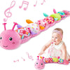 A pink caterpillar plush toy with musical notes attached, surrounded by colorful musical notes.