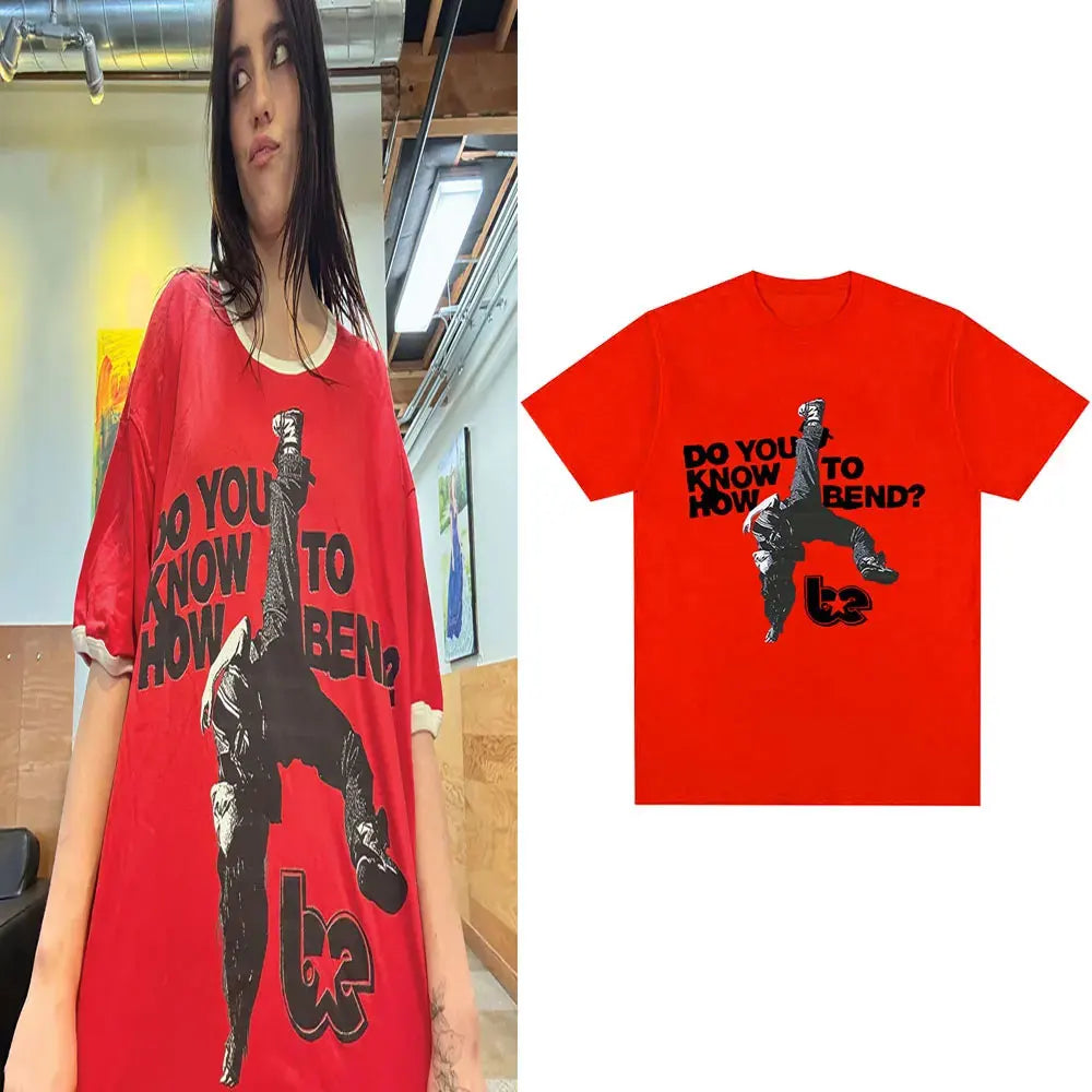 A red t-shirt featuring a black graphic with text on the front.