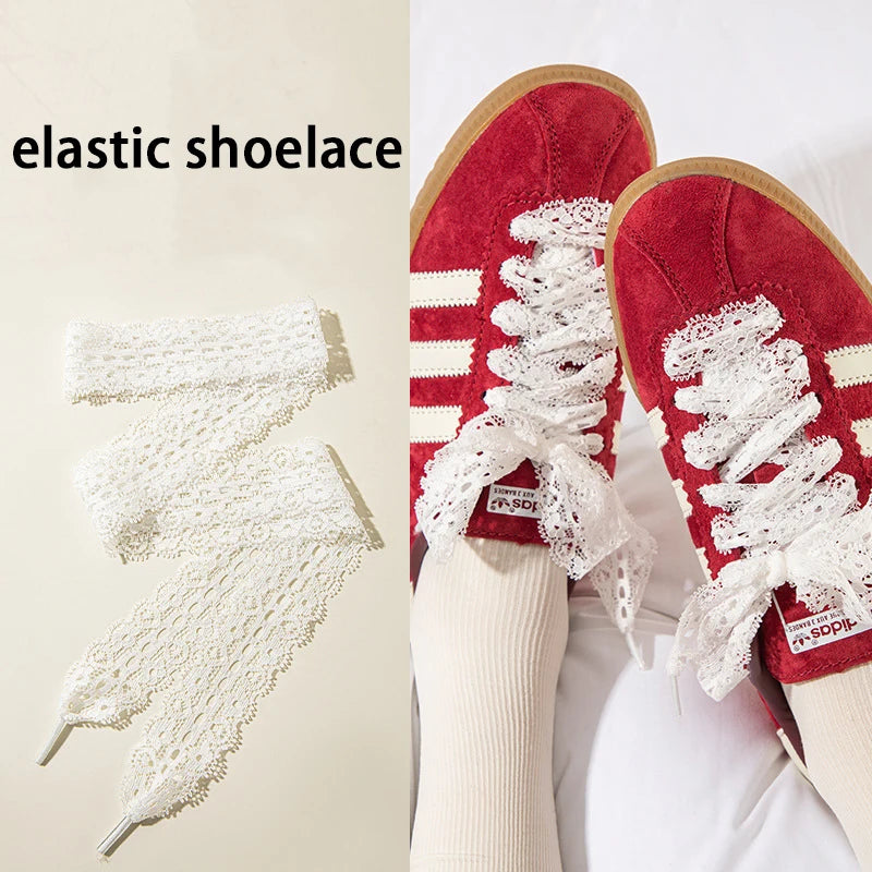 Red Adidas shoes with white elastic silk lace shoelaces on a person's foot.