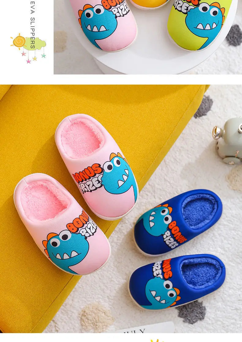 A set of pink and blue cartoon dinosaur plush slippers shown on a yellow surface.