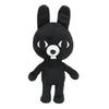 A black plush stuffed animal resembling a bunny with large eyes and a snout.
