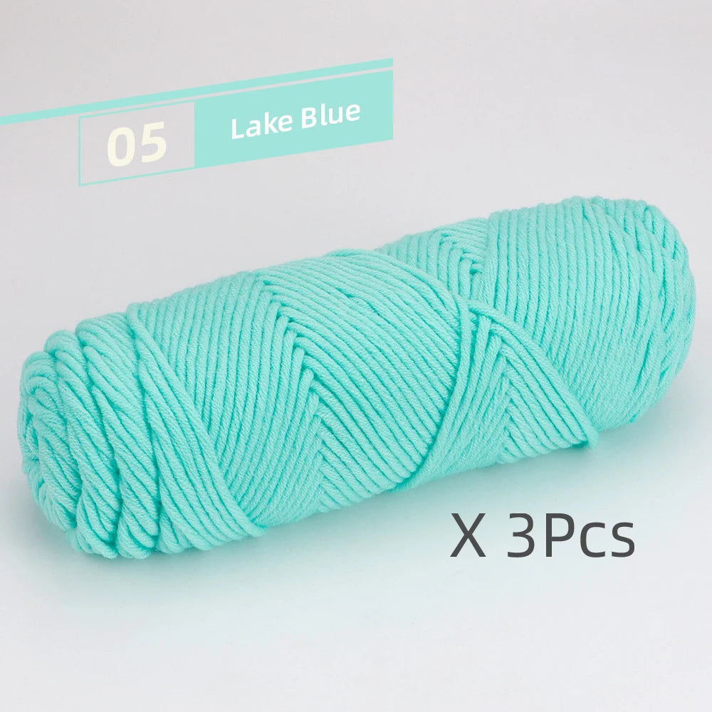 A skein of light blue yarn labeled as Lake Blue, shown in a coiled form.