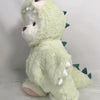 A light green plush teddy bear with spiky accents and a pink nose.