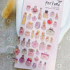 A sheet of 3D smile face crystal stickers for crafting and decorating, featuring various perfume bottle designs.