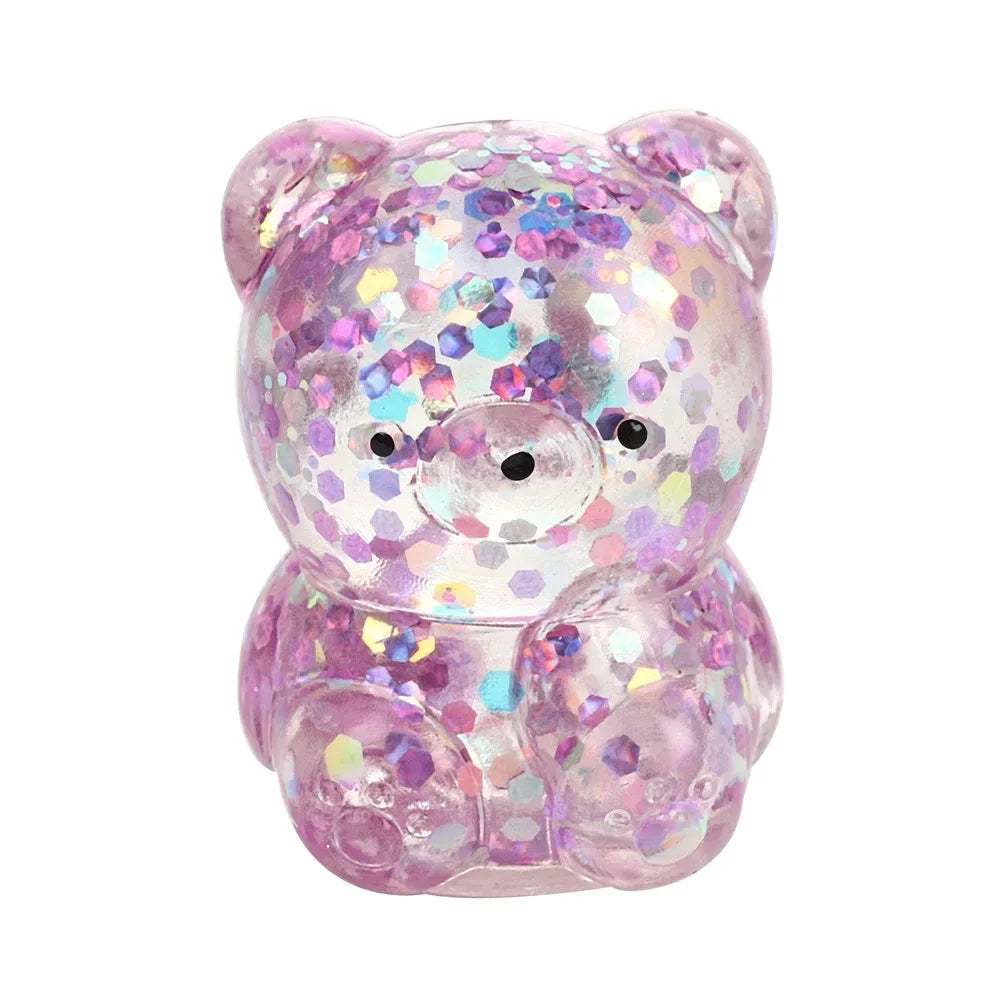 A translucent pink bear stress ball filled with colorful water beads.