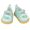 A pair of light blue unicorn skirt outfits for 18-inch dolls featuring white fabric and pink accents.